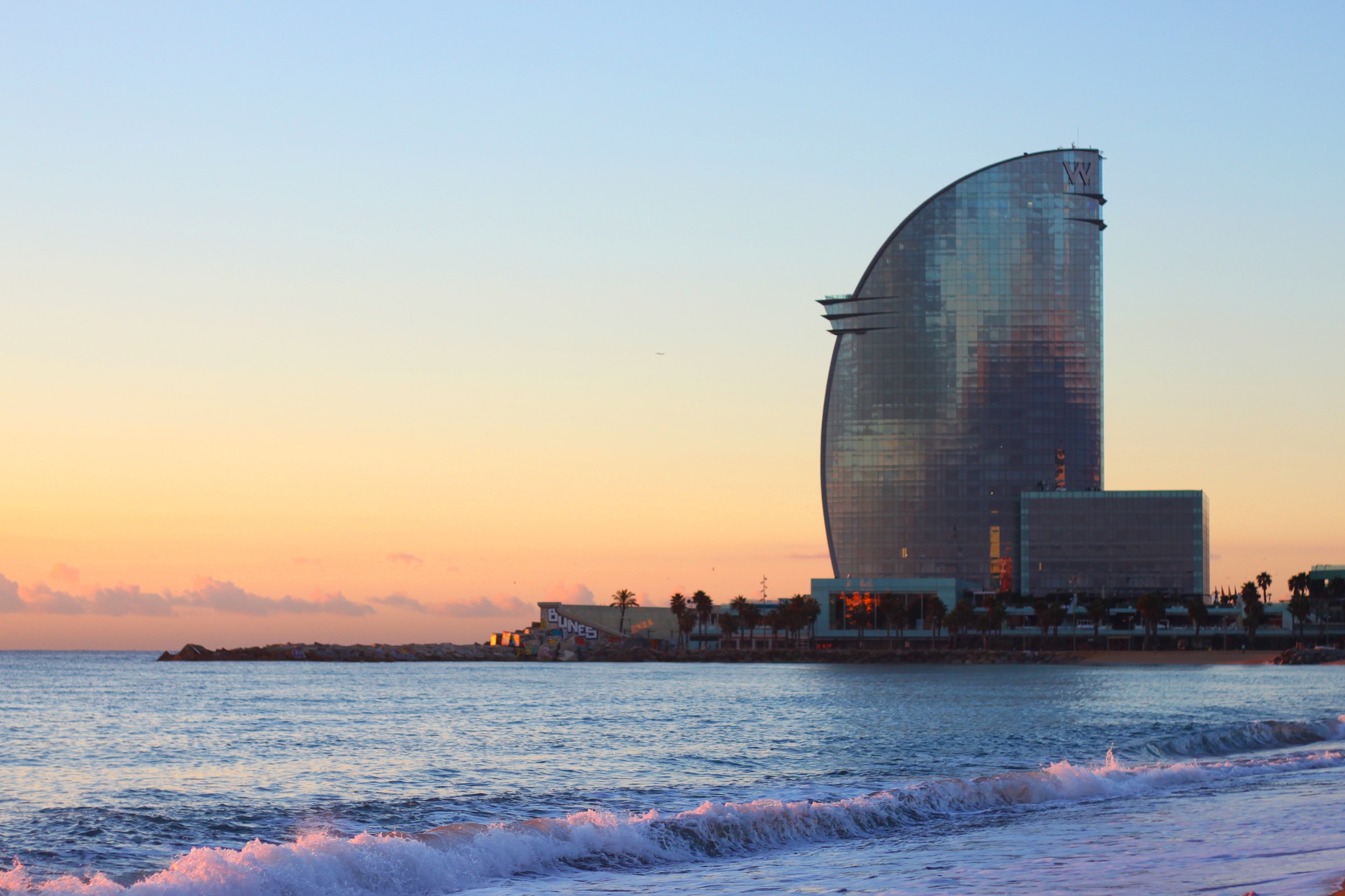 Sant Sebastià beach with the emblematic Barcelona's building in the background
