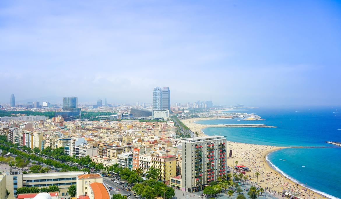 During the summer, Barcelona's beach is one of the venues where you can enjoy outdoor cinema / Photo: Enes via Unsplash