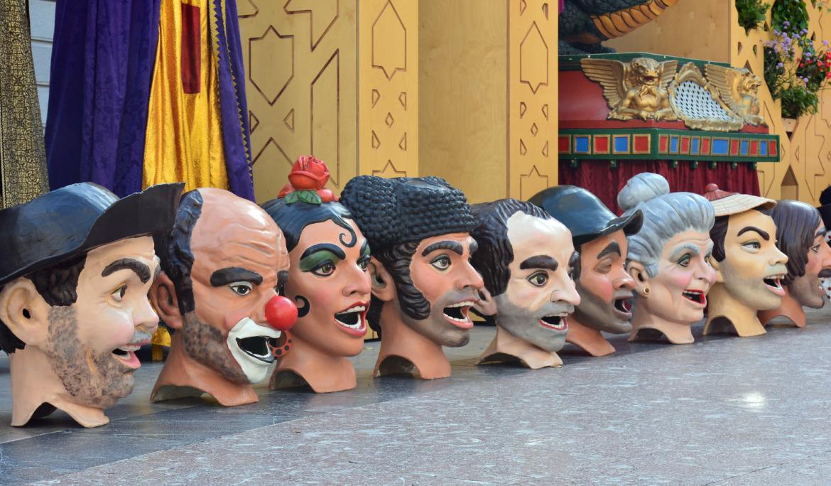 Big-heads of all sizes and colors, both male and female, on display in the street. Learning about Catalan culture is a great plan for things to do in Barcelona with kids.