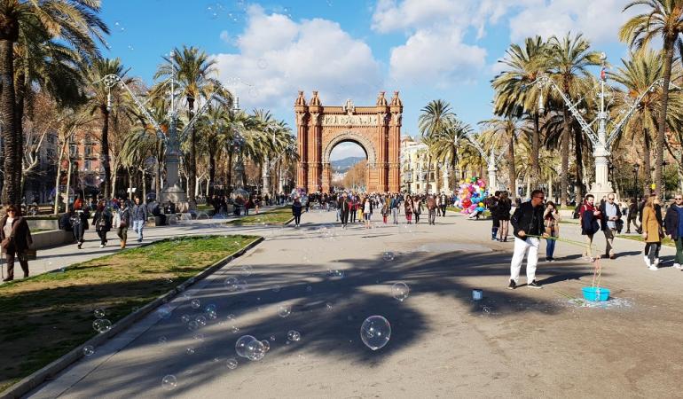 View of Lluis Companys promenade with the Triumphal Arch in the background